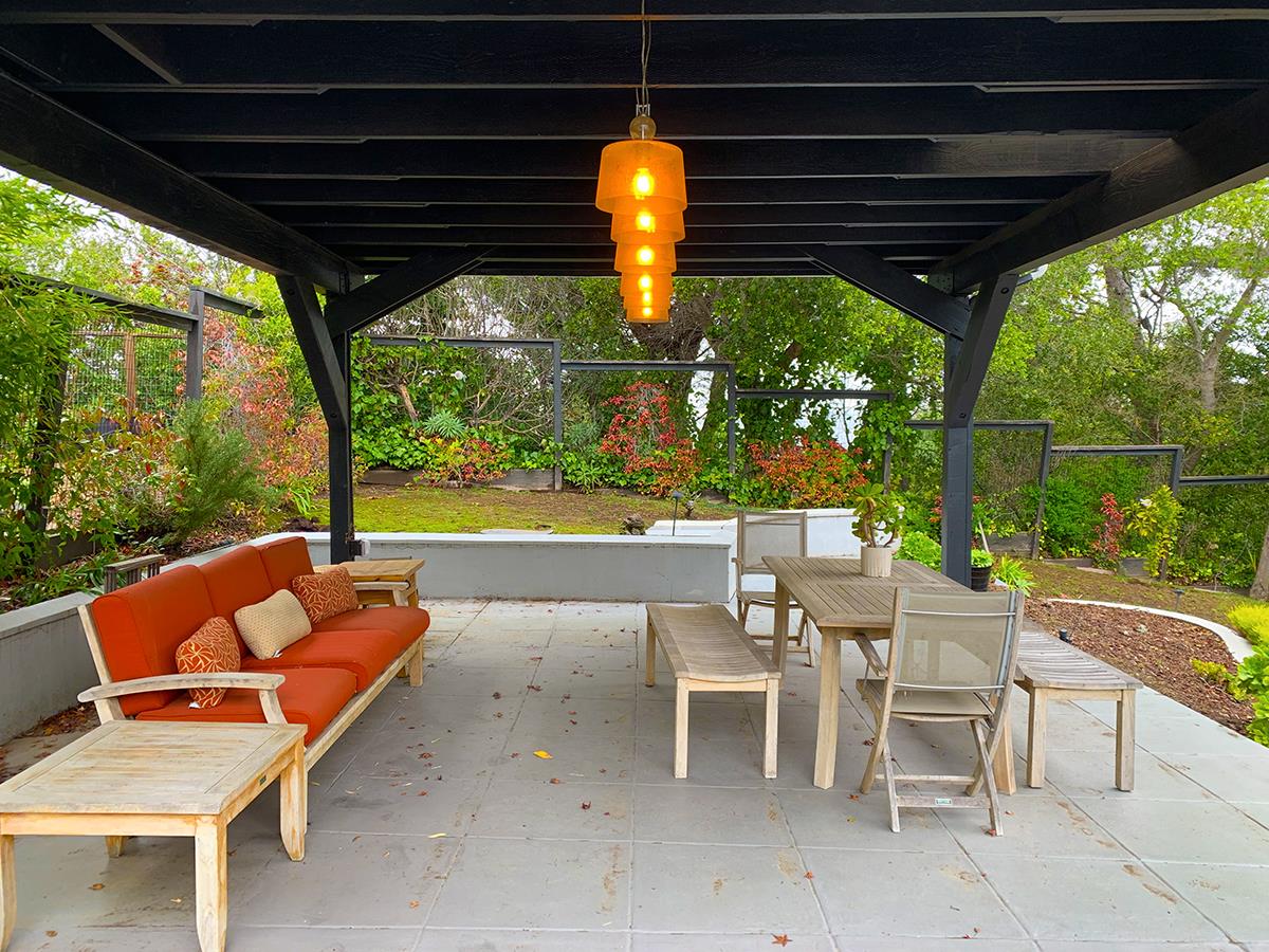 2912 Hillside Drive Burlingame, CA 94010 - Photo 8 of 19 a patio with yard table and chairs
