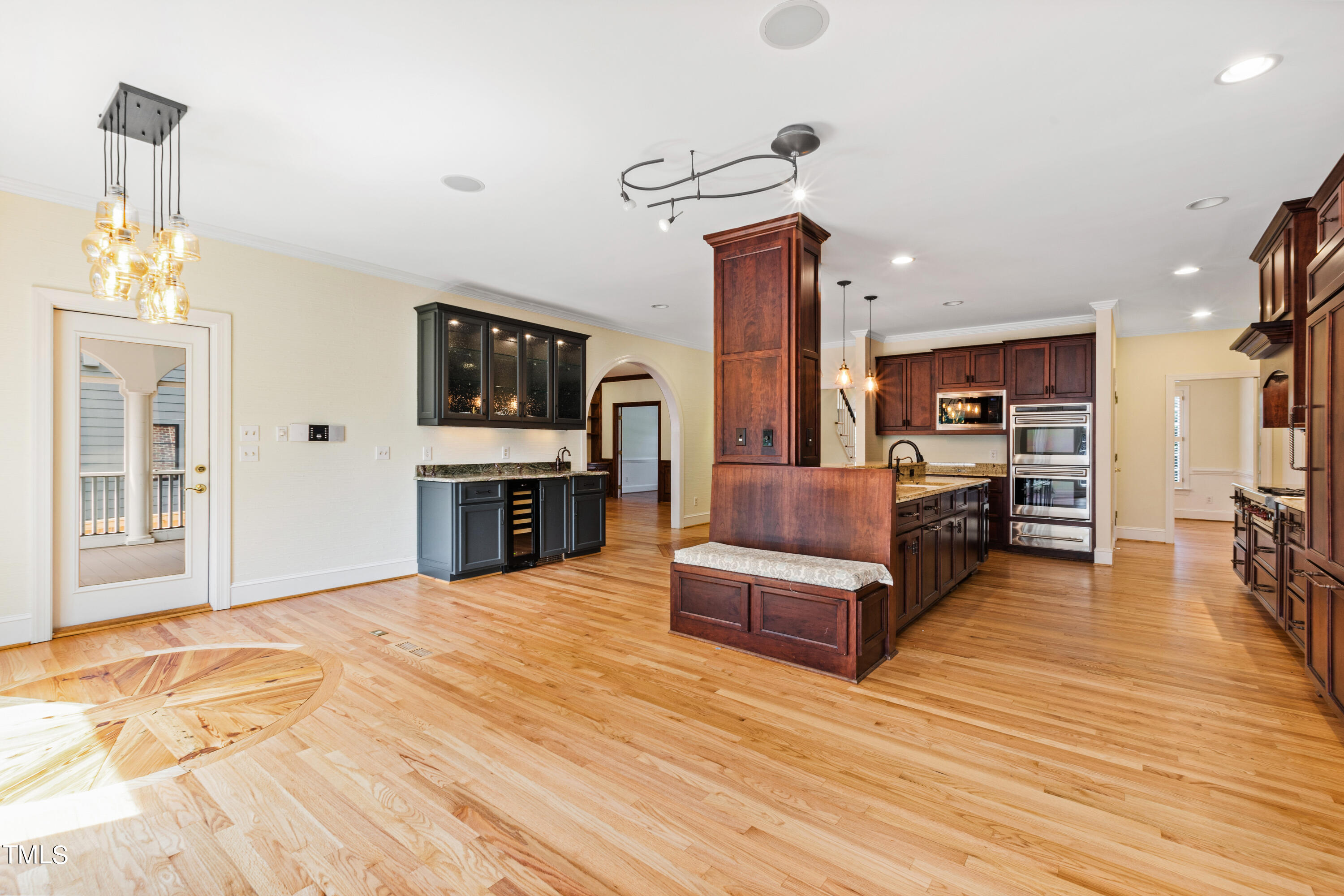 1804 Mcdonald Lane Raleigh, NC 27608 - Photo 19 of 62 a living room with furniture and a flat screen tv