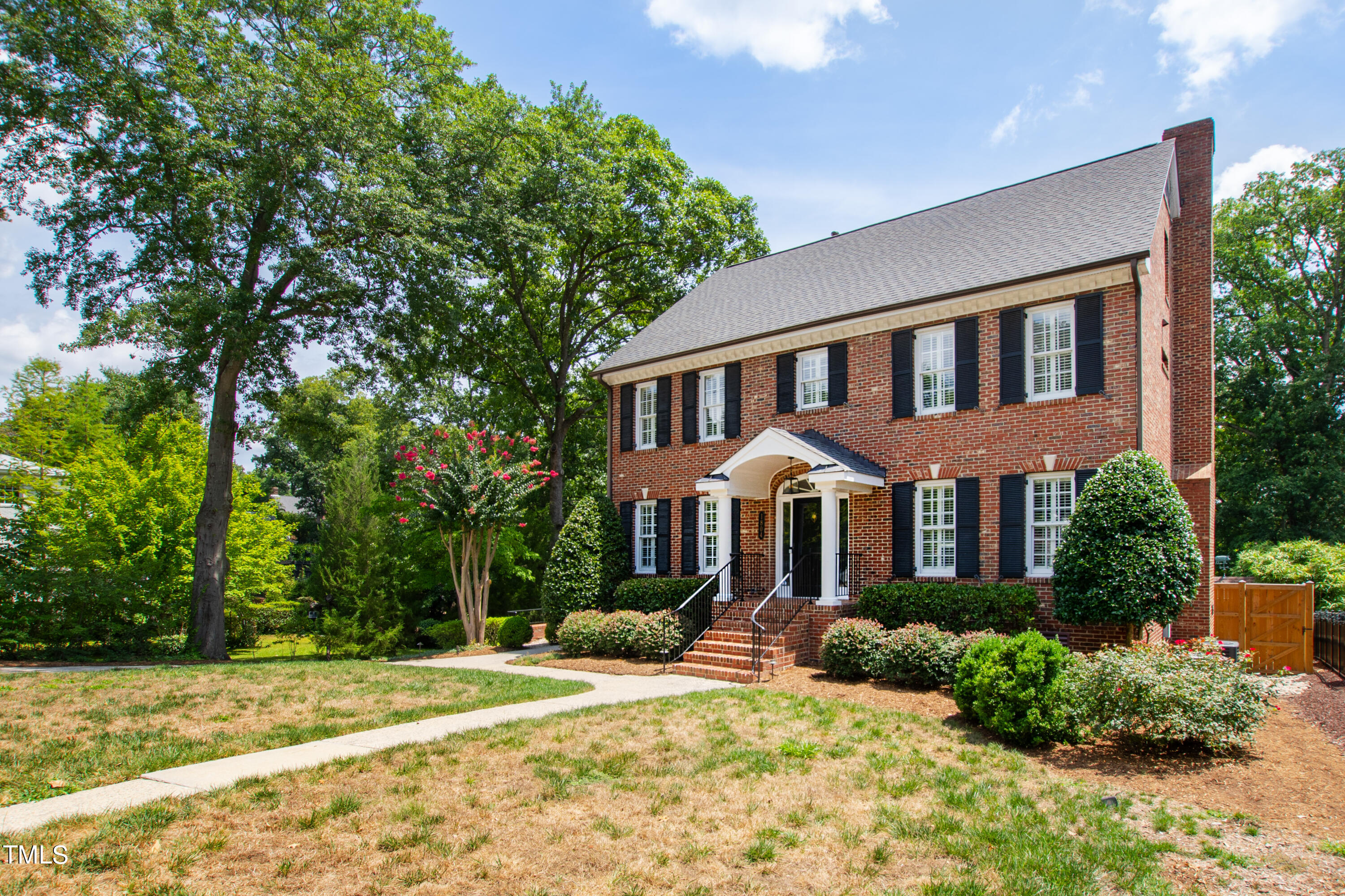 1804 Mcdonald Lane Raleigh, NC 27608 - Photo 2 of 62 a front view of a house with a yard
