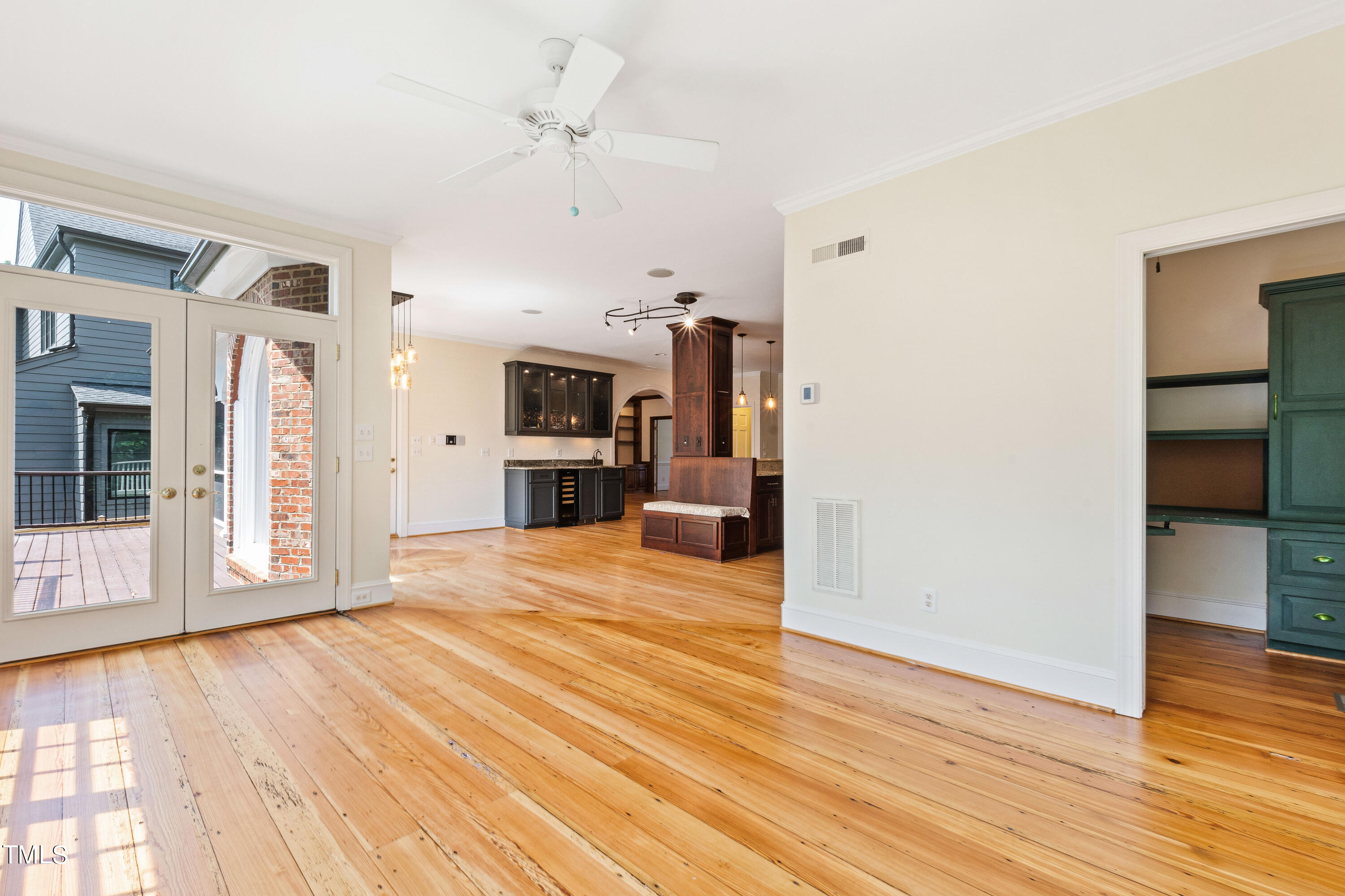 1804 Mcdonald Lane Raleigh, NC 27608 - Photo 26 of 62 a view of a kitchen with a sink and a refrigerator wooden floor