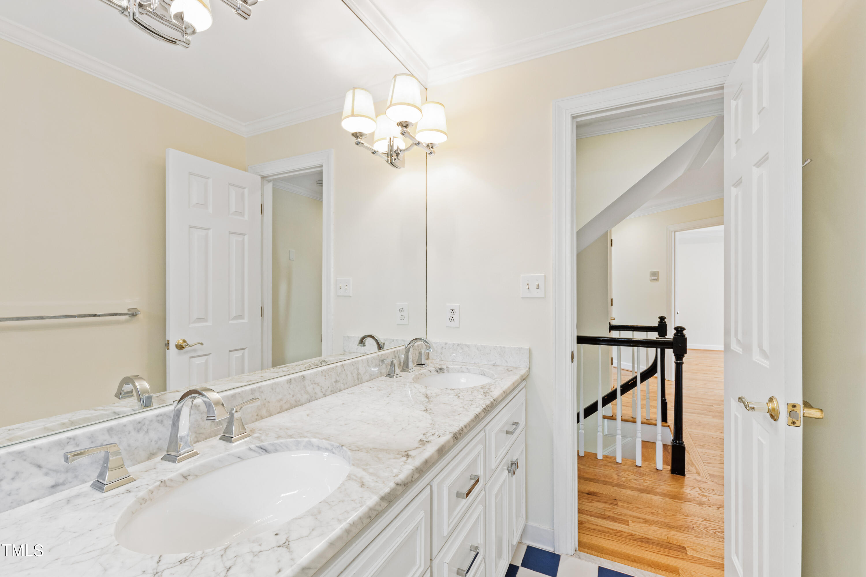 1804 Mcdonald Lane Raleigh, NC 27608 - Photo 29 of 62 a bathroom with a granite countertop sink a large mirror and a shower
