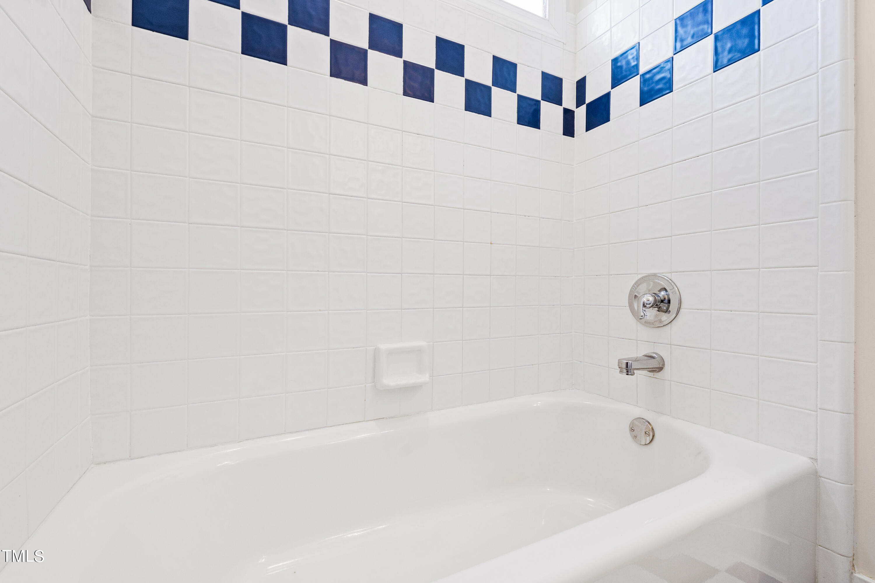 1804 Mcdonald Lane Raleigh, NC 27608 - Photo 30 of 62 a bathroom with a bathtub and a shower
