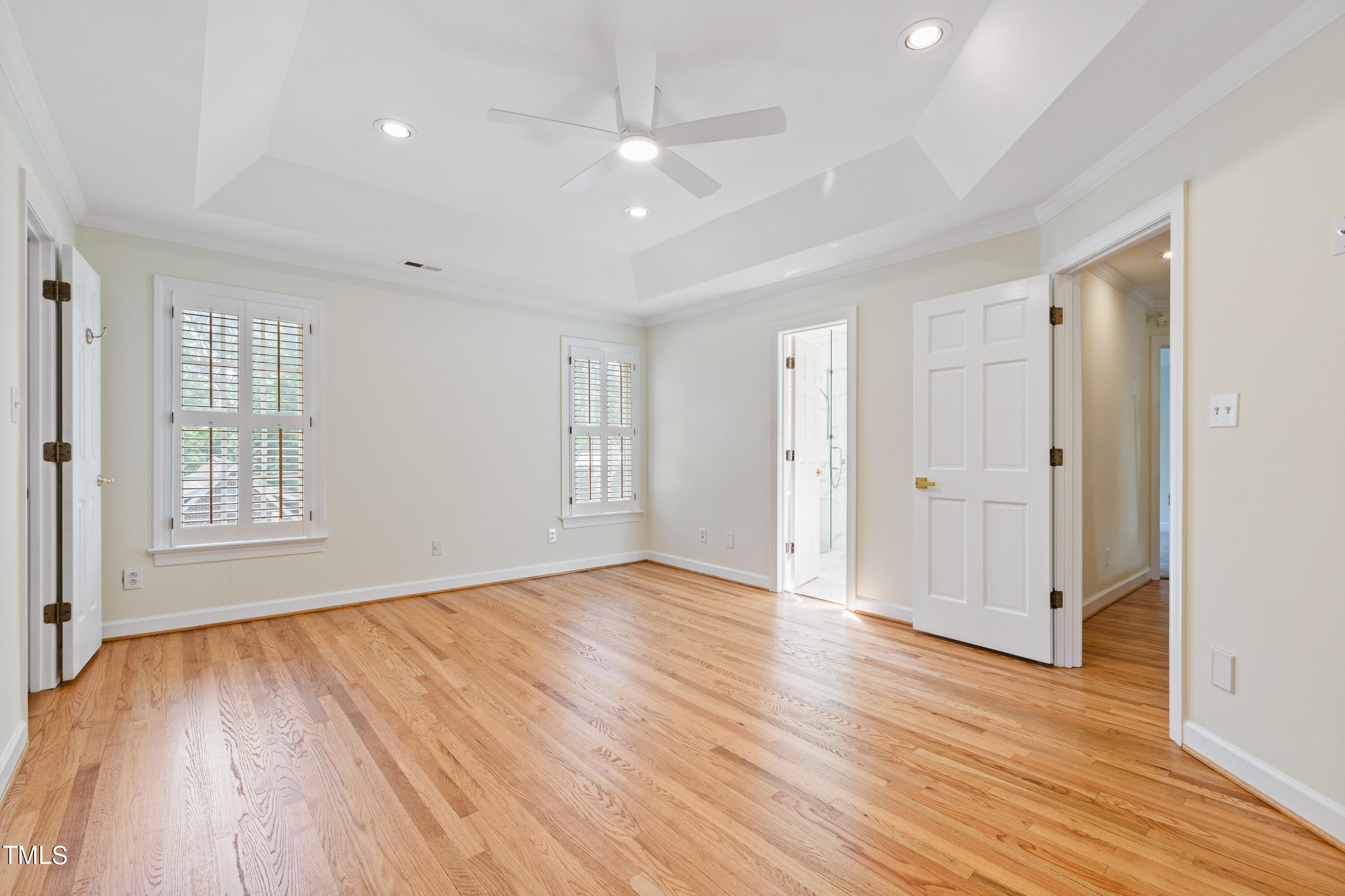 1804 Mcdonald Lane Raleigh, NC 27608 - Photo 35 of 62 wooden floor in an empty room with a window