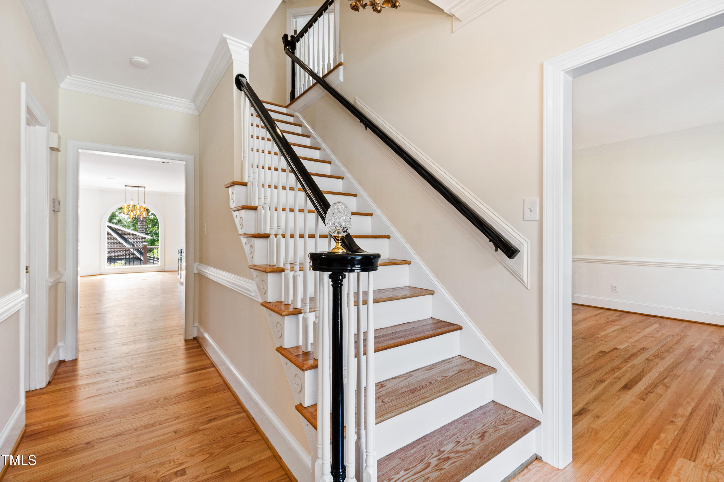 1804 Mcdonald Lane Raleigh, NC 27608 - Photo 4 of 62 a view of entryway and hall with wooden floor