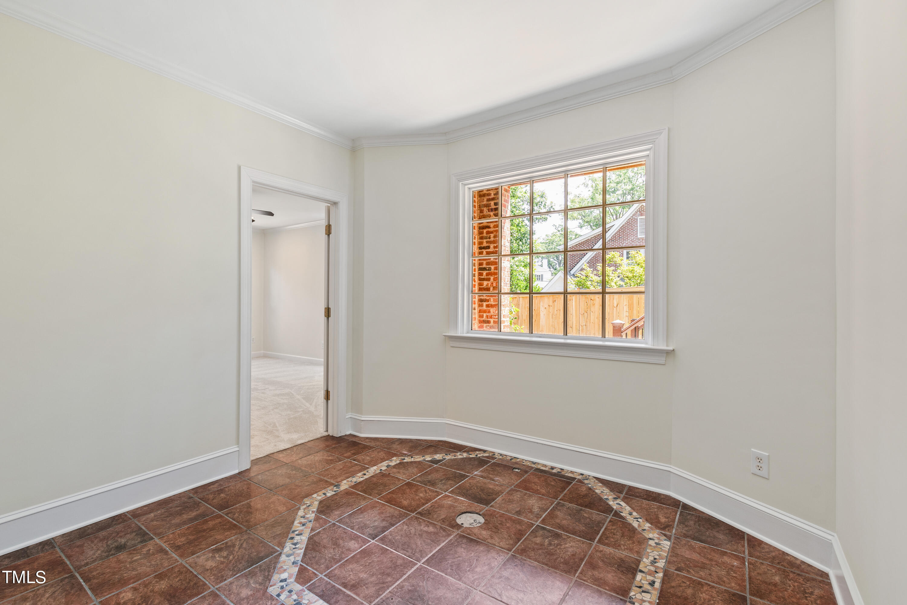 1804 Mcdonald Lane Raleigh, NC 27608 - Photo 44 of 62 a view of an empty room with a window