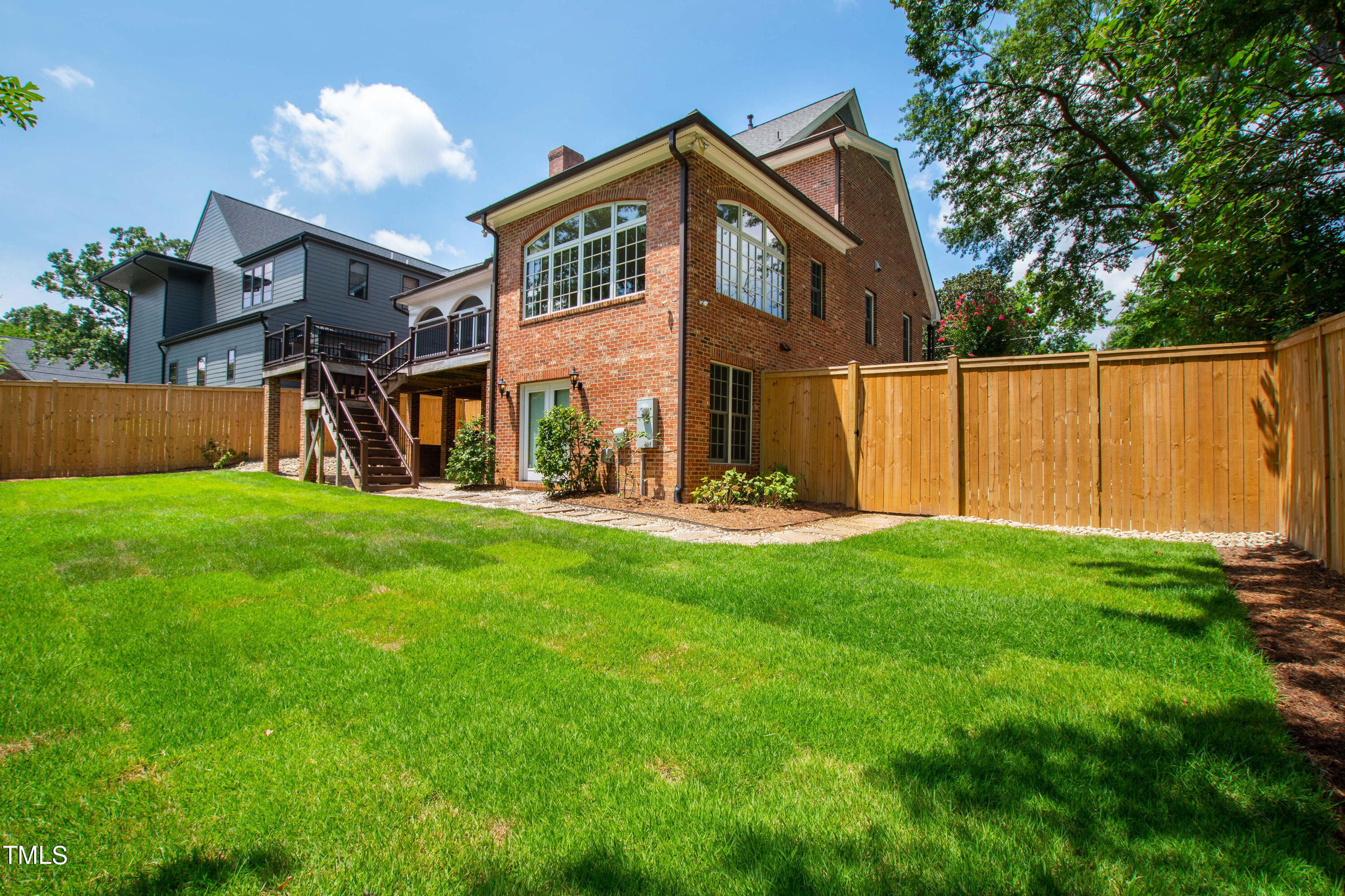 1804 Mcdonald Lane Raleigh, NC 27608 - Photo 48 of 62 a front view of house with yard and green space