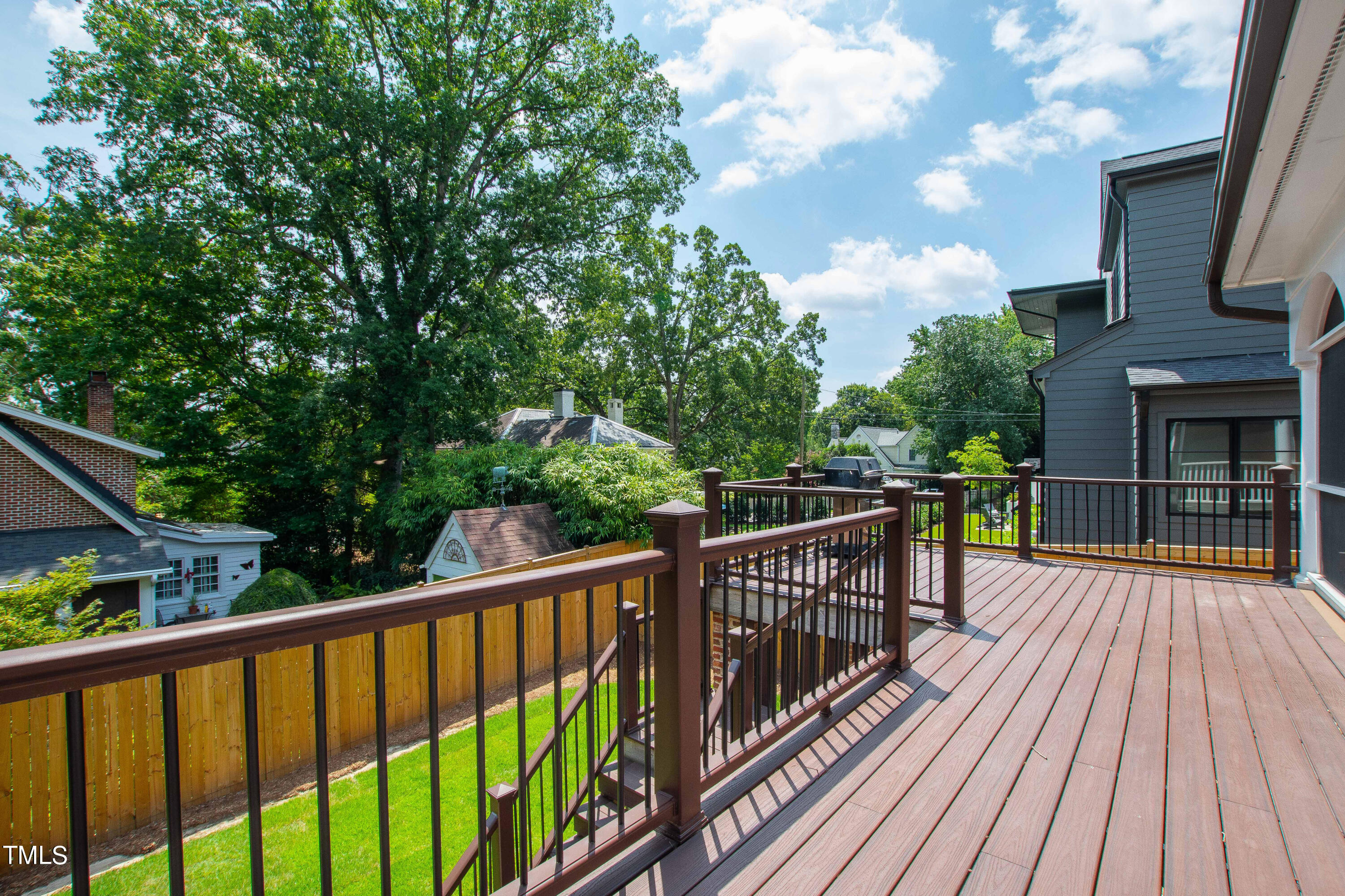 1804 Mcdonald Lane Raleigh, NC 27608 - Photo 56 of 62 a view of balcony with deck and wooden floor