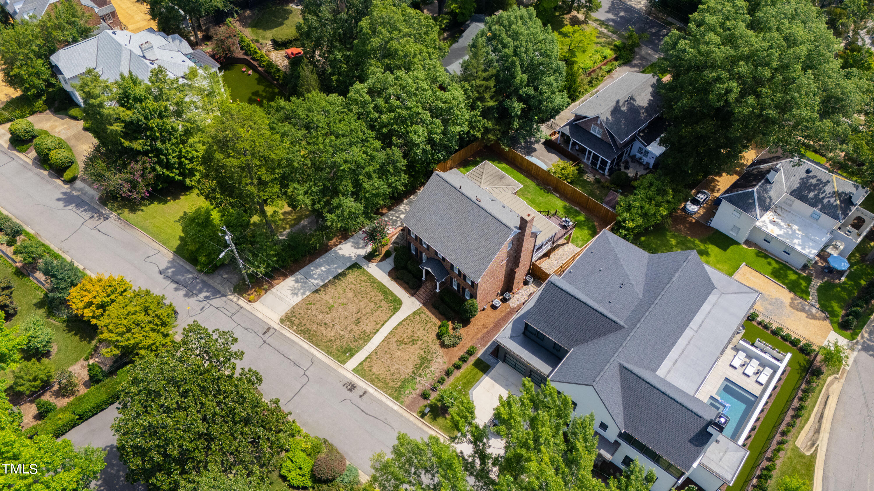 1804 Mcdonald Lane Raleigh, NC 27608 - Photo 57 of 62 an aerial view of a house with a yard