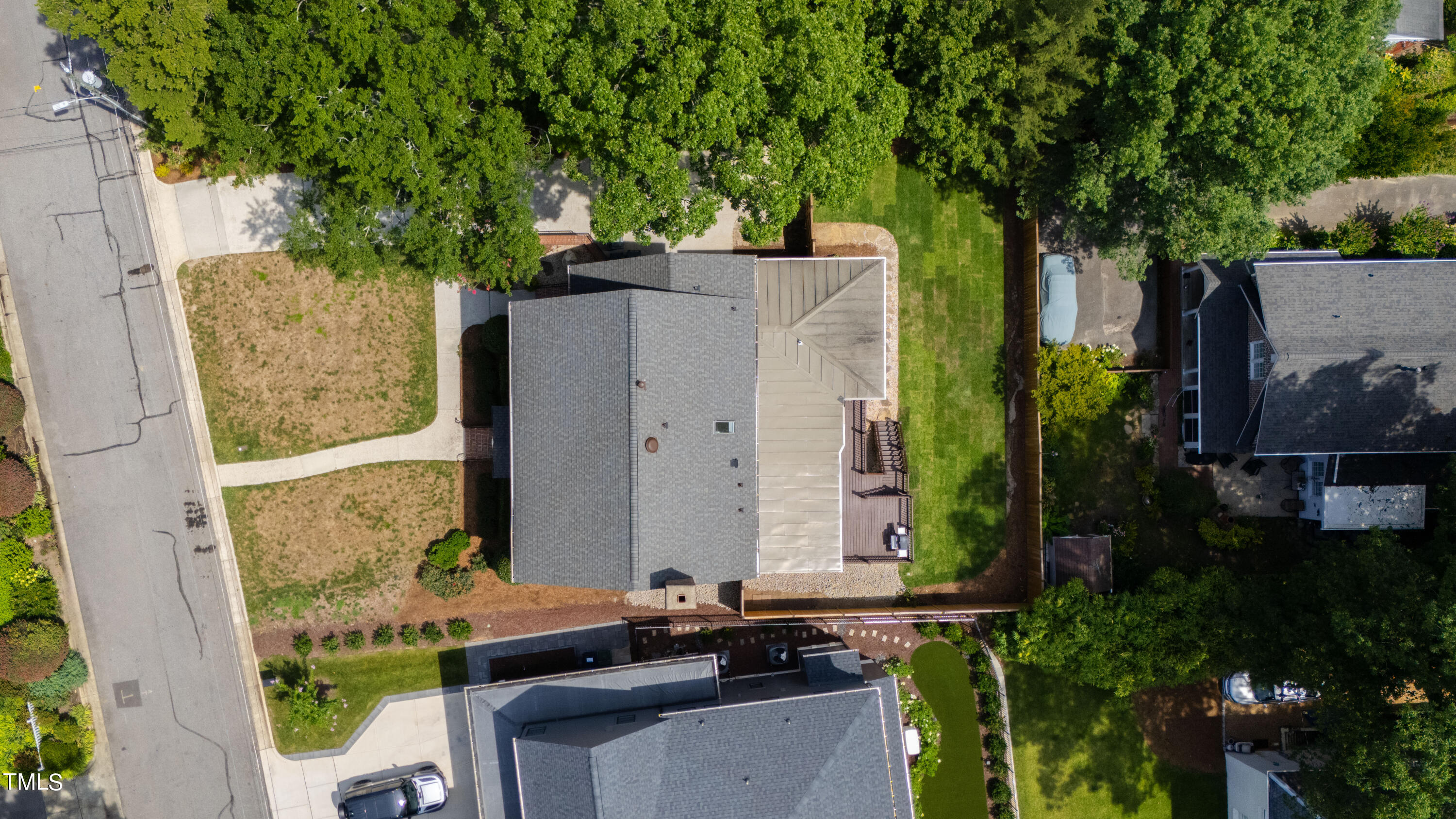 1804 Mcdonald Lane Raleigh, NC 27608 - Photo 58 of 62 aerial view of a house with a backyard