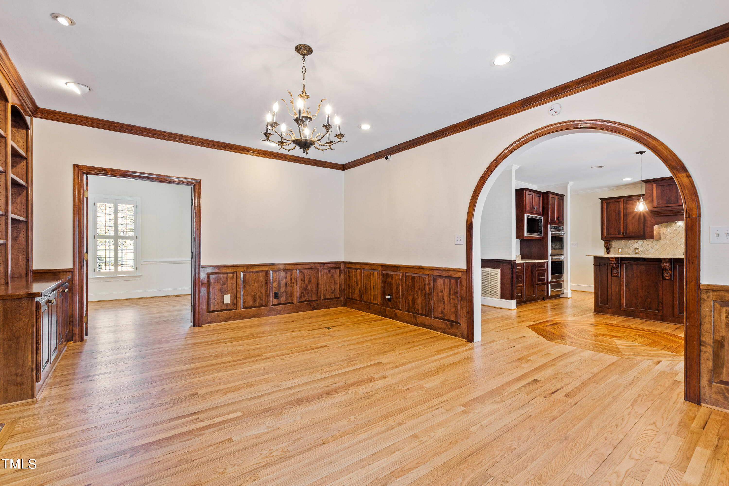 1804 Mcdonald Lane Raleigh, NC 27608 - Photo 6 of 62 a view of empty room with wooden floor