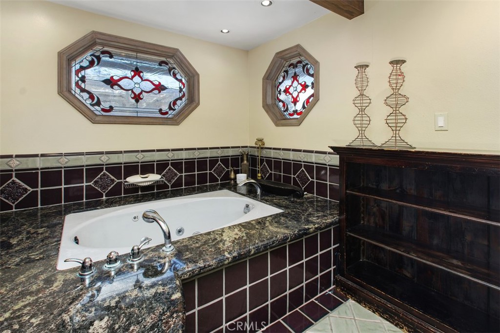 27777 Sycamore Mesa Road Temecula, CA 92590 - Photo 33 of 72 Primary bath with stained glass windows