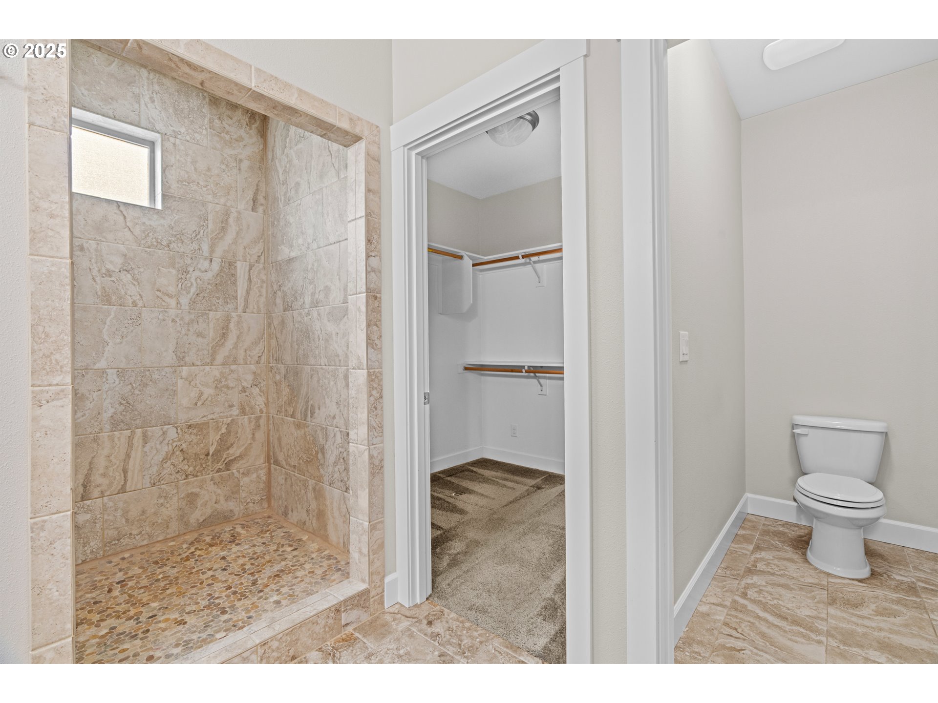 834 North 13th Place Ridgefield, WA 98642 - Photo 13 of 33 a bathroom with a shower and a toilet