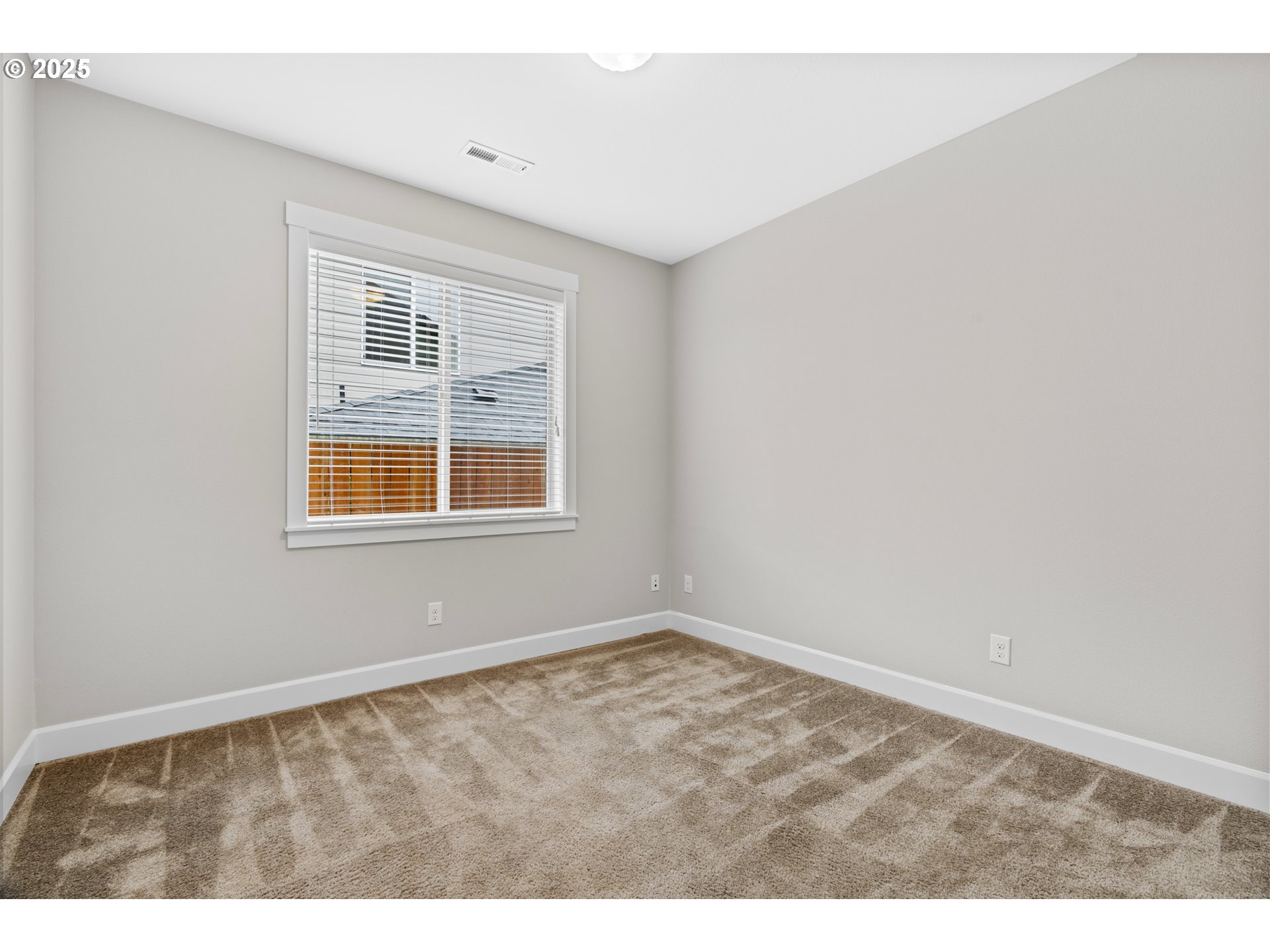 834 North 13th Place Ridgefield, WA 98642 - Photo 15 of 33 a view of an empty room with a window