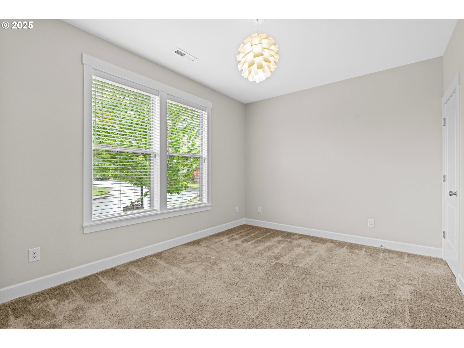 834 North 13th Place Ridgefield, WA 98642 - Photo 20 of 33 a view of an empty room with a window