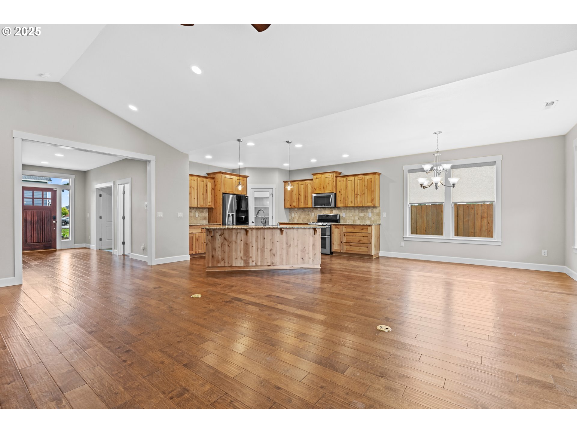 834 North 13th Place Ridgefield, WA 98642 - Photo 2 of 33 a view of a kitchen with a sink and a large window