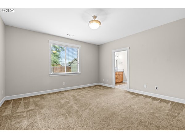 834 North 13th Place Ridgefield, WA 98642 - Photo 25 of 33 a view of an empty room with a window