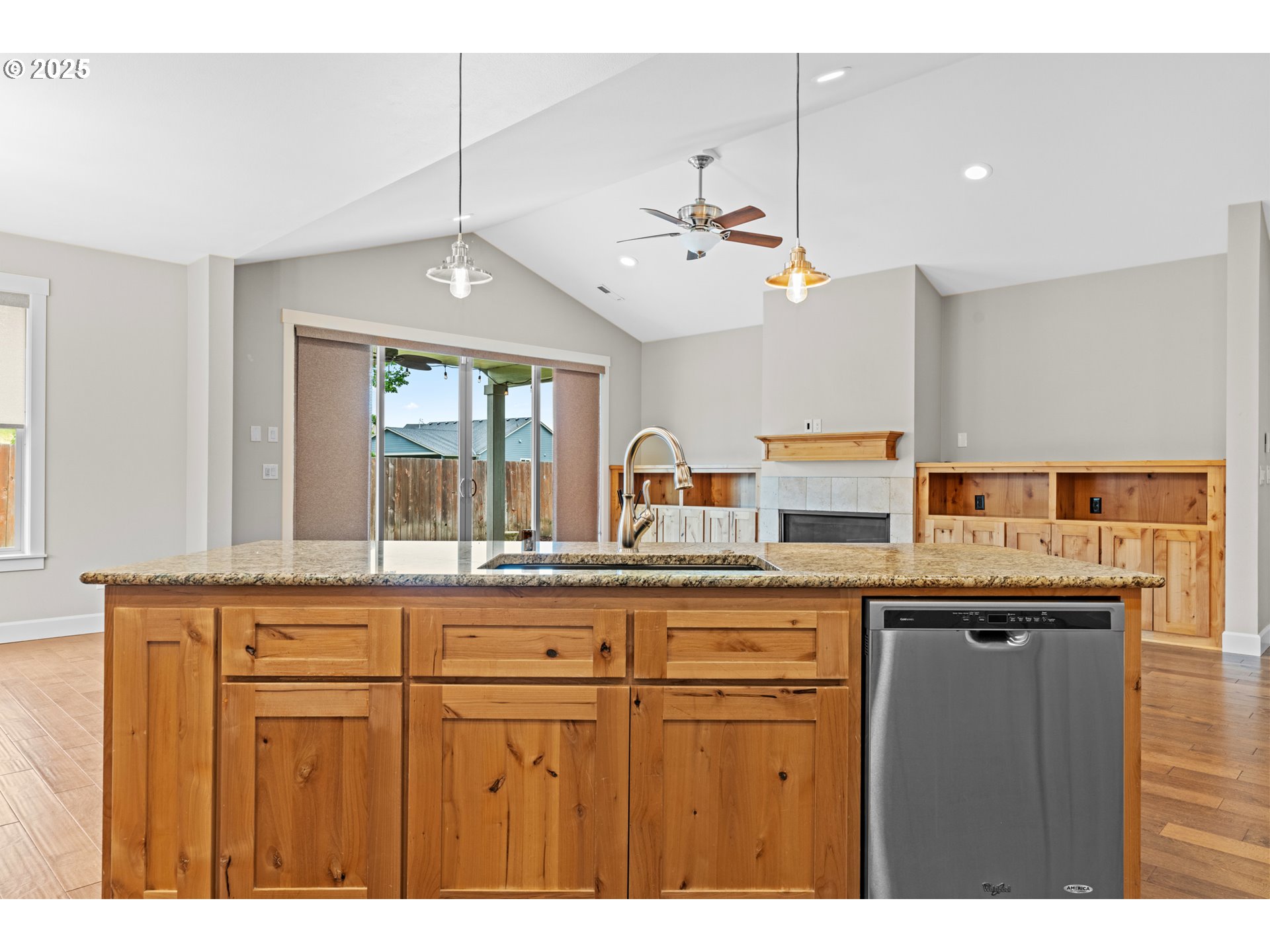834 North 13th Place Ridgefield, WA 98642 - Photo 7 of 33 a kitchen with a sink a counter space cabinets and stainless steel appliances