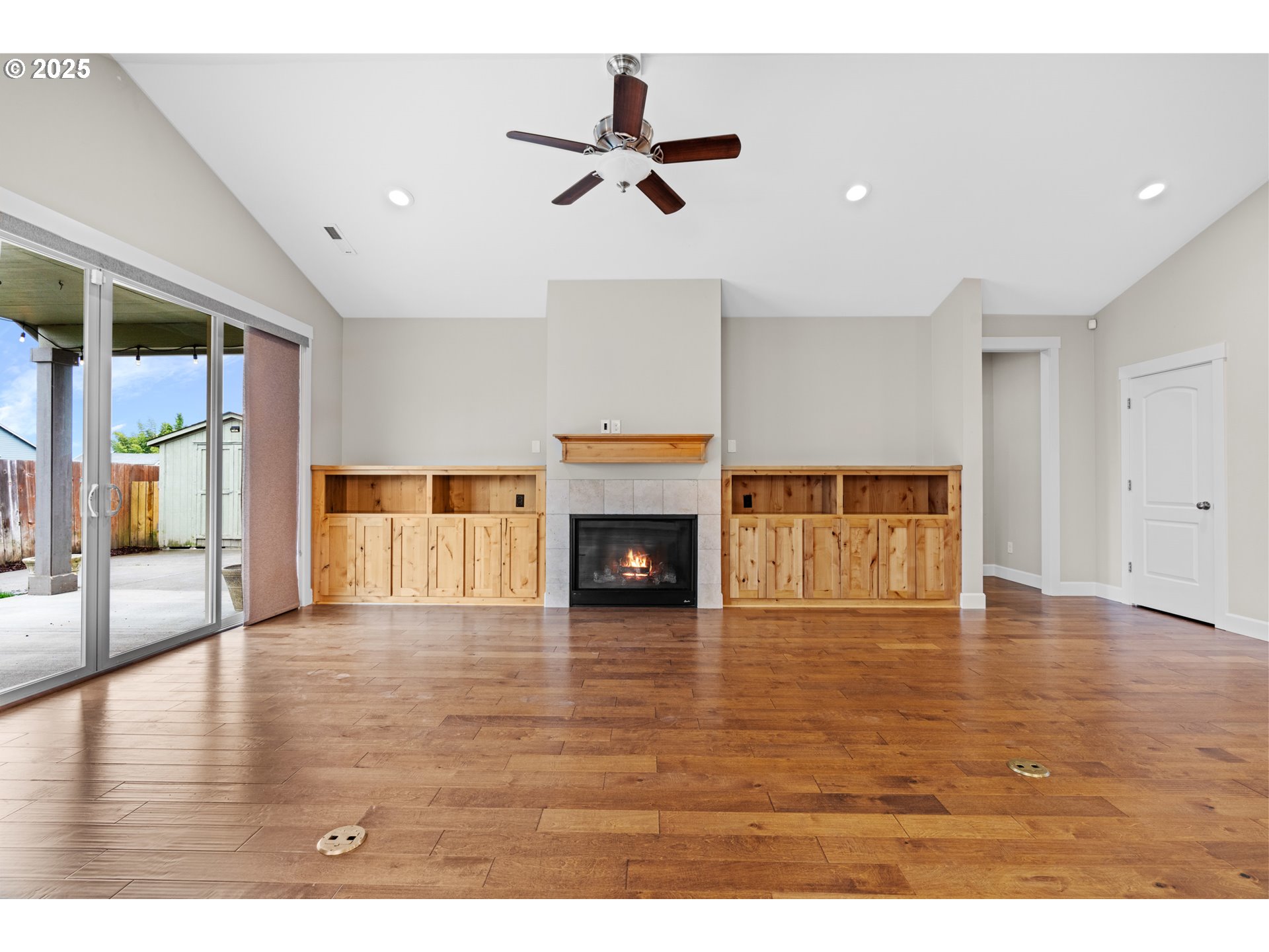 834 North 13th Place Ridgefield, WA 98642 - Photo 8 of 33 a living room with furniture and a fireplace
