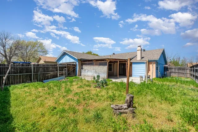 a house view with a garden space