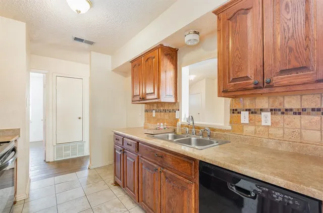 a kitchen with a sink and a cabinets