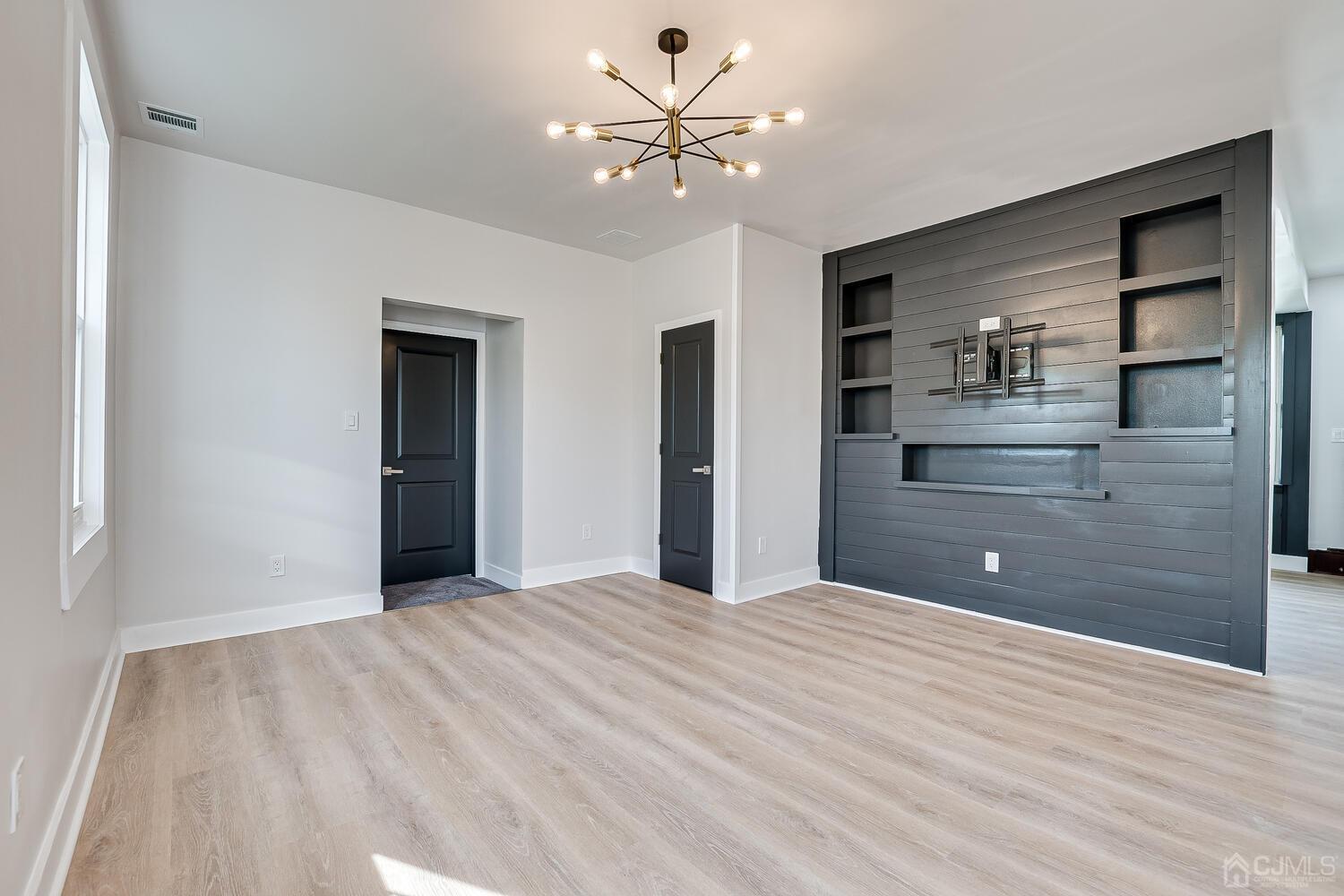 324 Main Street, Unit 2 South Amboy, NJ 08879 - Photo 12 of 26 a bathroom with a sink vanity and a shower