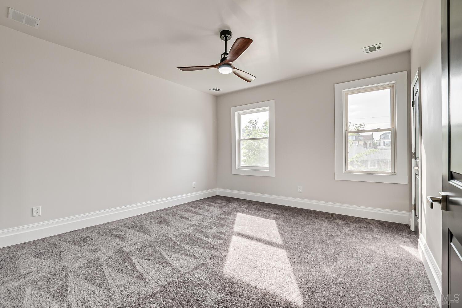 324 Main Street, Unit 2 South Amboy, NJ 08879 - Photo 14 of 26 a view of empty room with ceiling fan