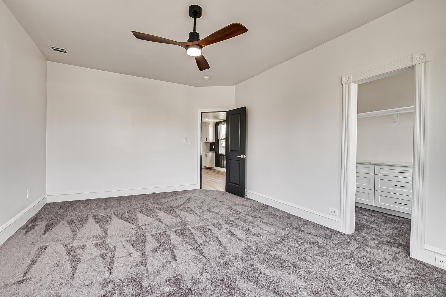 324 Main Street, Unit 2 South Amboy, NJ 08879 - Photo 17 of 26 wooden floor in an empty room