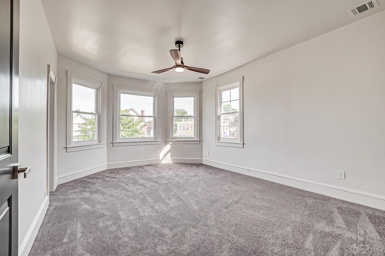 324 Main Street, Unit 2 South Amboy, NJ 08879 - Photo 18 of 26 a view of an empty room with a window