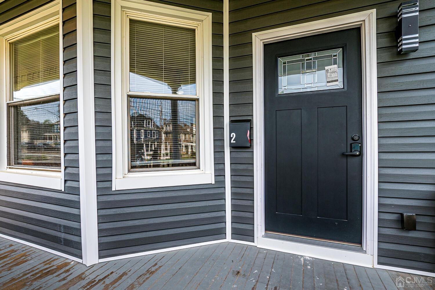 324 Main Street, Unit 2 South Amboy, NJ 08879 - Photo 4 of 26 a view of front door of house