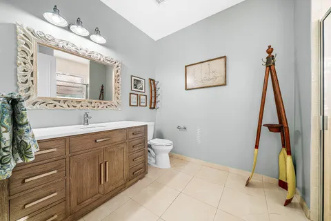 a view of a hallway with entryway and front door