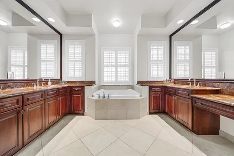 a view of a swimming pool with lounge chair