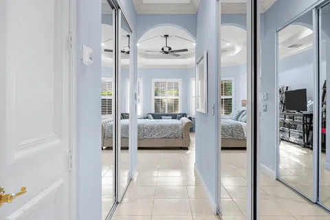 a view of a swimming pool with chairs