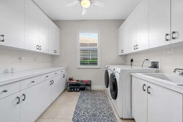 a view of a swimming pool with chairs
