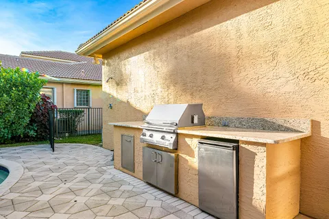 an aerial view of a houses with a lake view