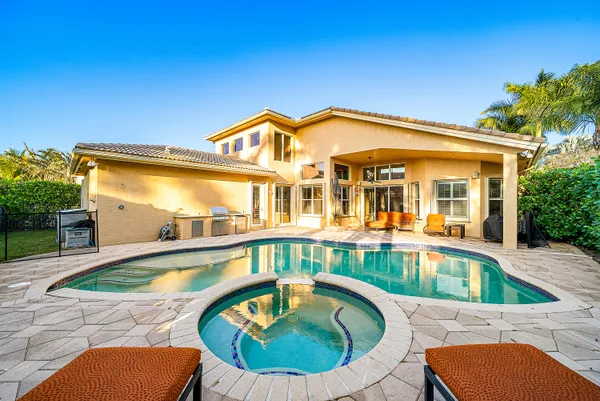 an aerial view of residential building and ocean