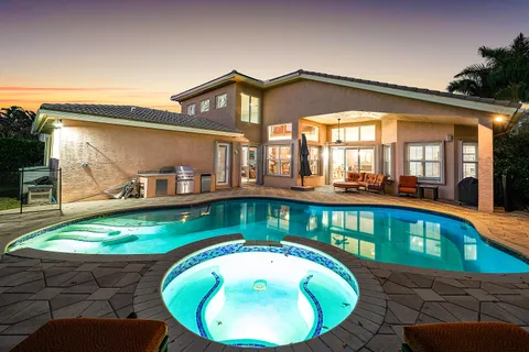 an aerial view of residential building and ocean