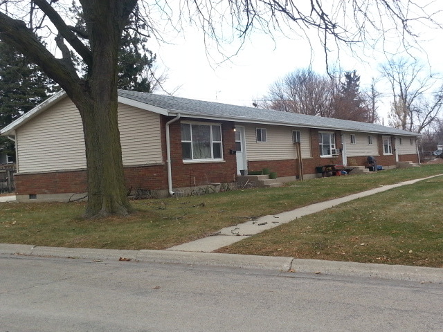 117 8th Street Rochelle, IL 61068 - Photo 1 of 7 a view of a yard in front view of a house