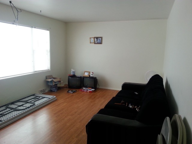 117 8th Street Rochelle, IL 61068 - Photo 4 of 7 a room with furniture and a window