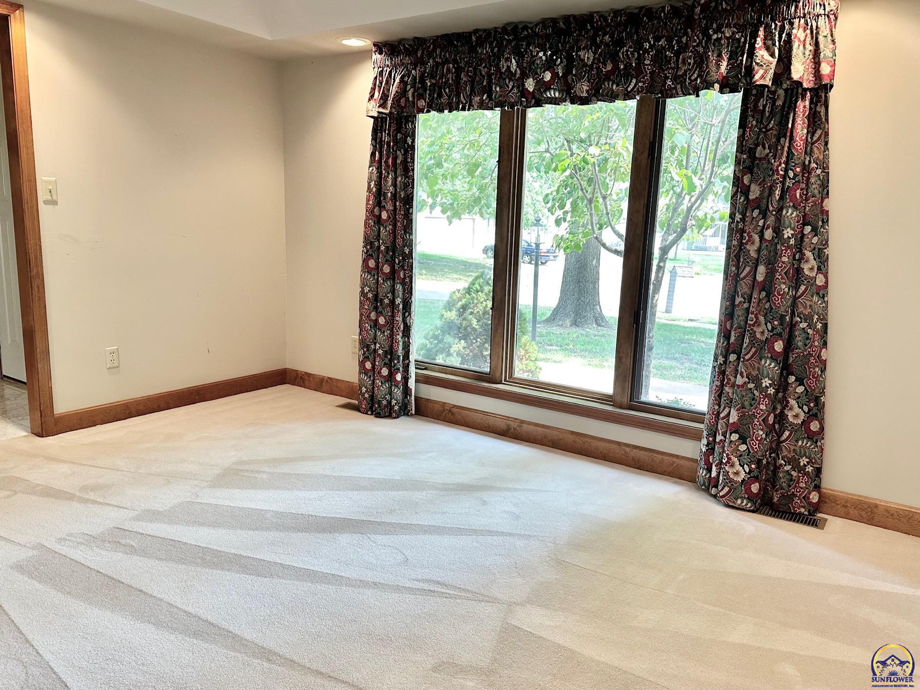 3101 Southwest Muirfield Court Topeka, KS 66614 - Photo 15 of 51 Formal Dining Room or Living Room.