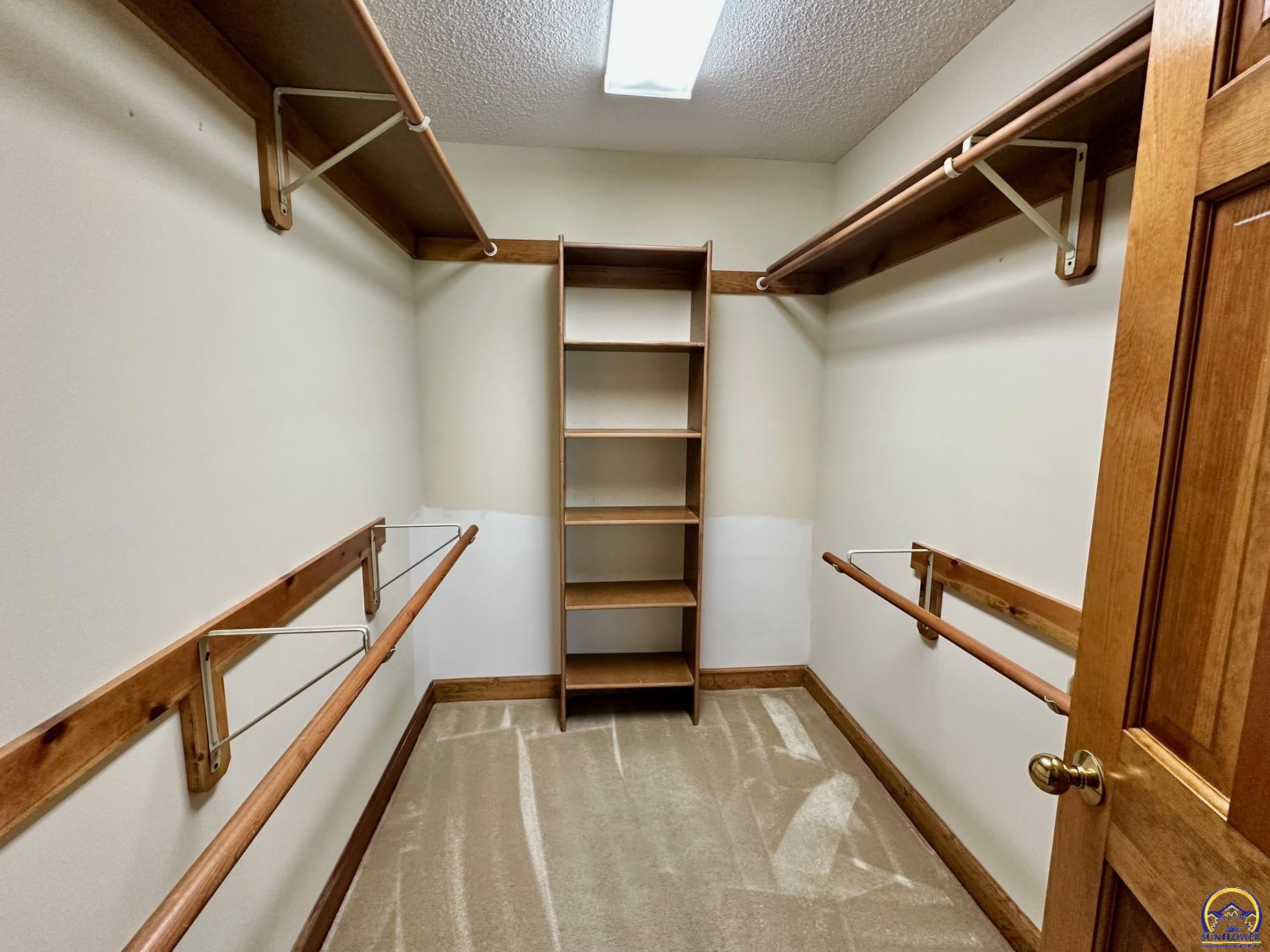 3101 Southwest Muirfield Court Topeka, KS 66614 - Photo 30 of 51 Walk in closet in Primary Bedroom.