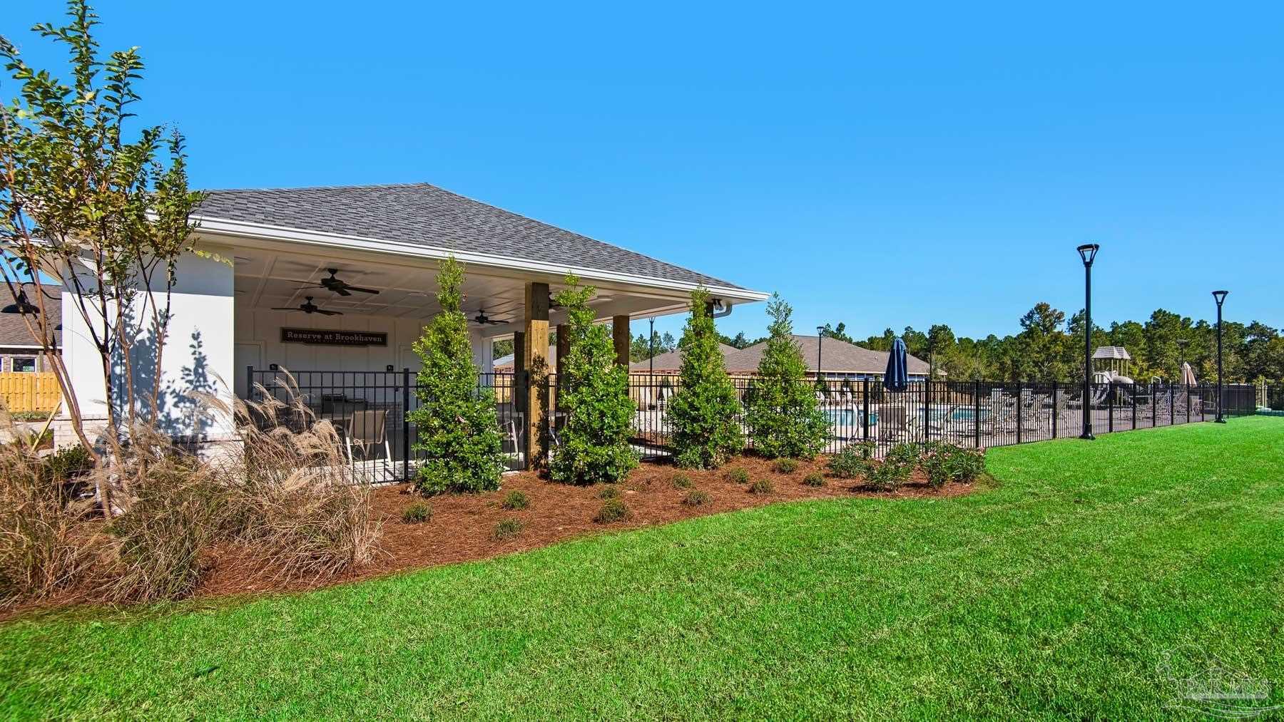 3419 Crossvine Road Cantonment, FL 32533 - Photo 42 of 45 a view of a porch with a yard
