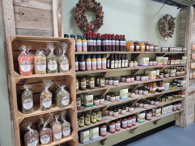 a view of a house with a flower garden