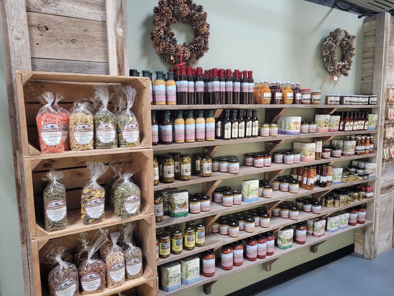 3669 G Road Palisade, CO 81526 - Photo 23 of 40 a table with wine bottles and glasses
