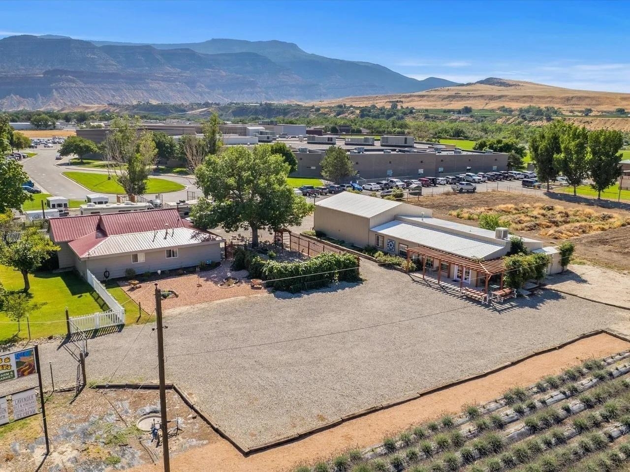3669 G Road Palisade, CO 81526 - Photo 6 of 40 a view of a terrace with furniture and a city view