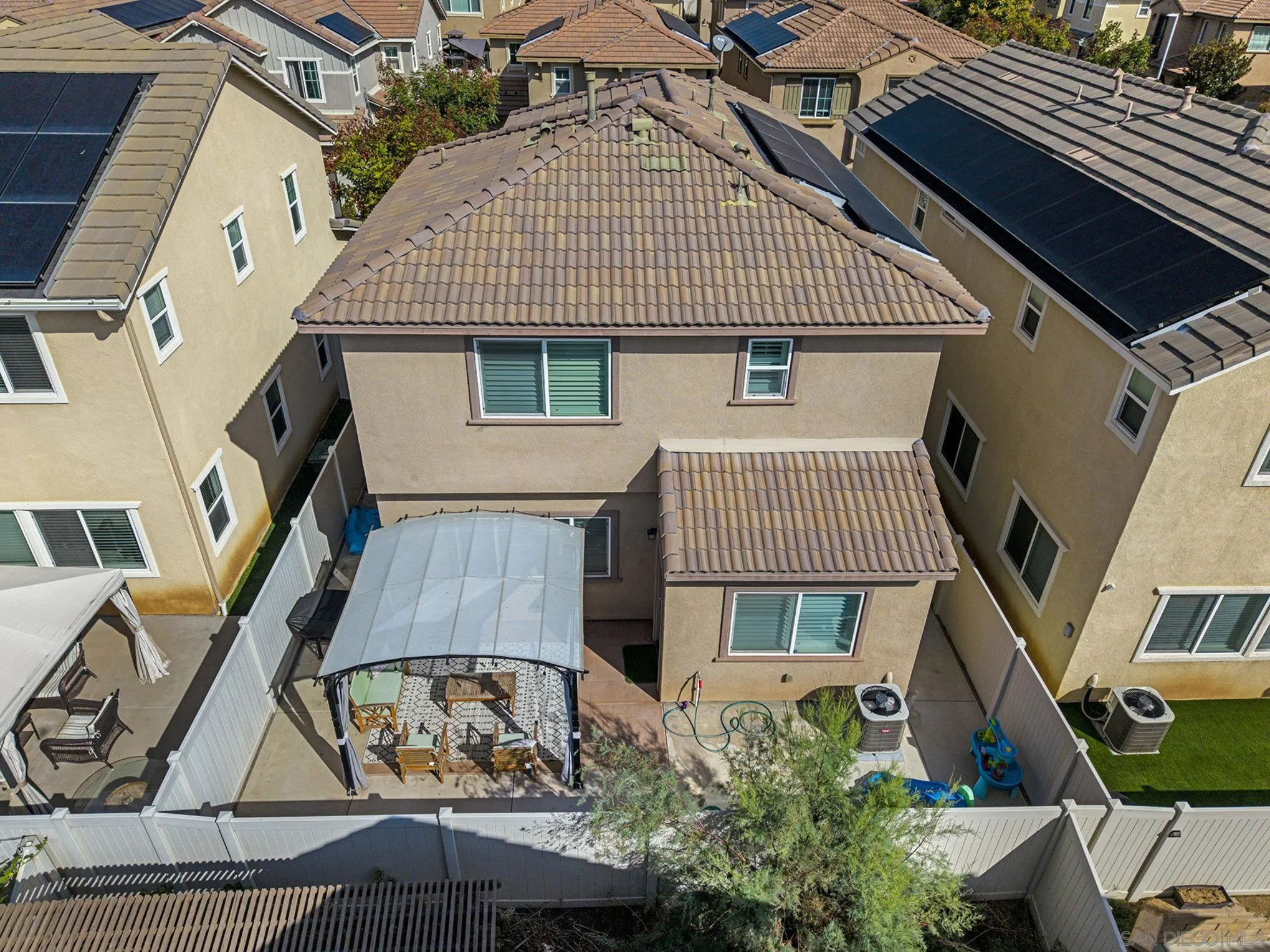 35406 Brown Galloway Lane Fallbrook, CA 92028 - Photo 21 of 30 Backyard has a wonderful patio with shade and artificial turf for easy living