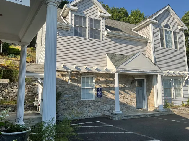 a view of a house with a patio