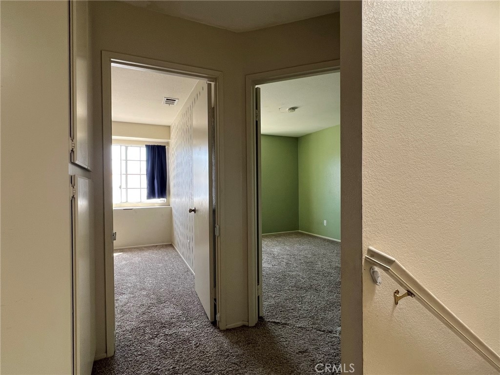 1505 Salmon River Road Riverside, CA 92501 - Photo 11 of 20 a view of a bathroom from a hallway