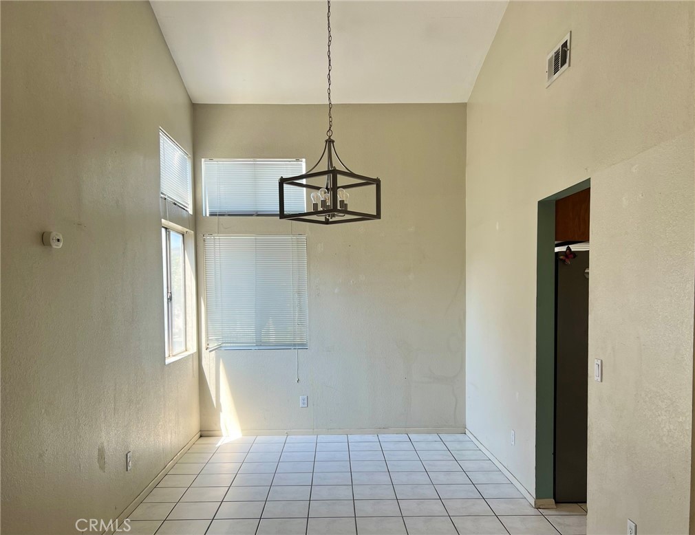 1505 Salmon River Road Riverside, CA 92501 - Photo 4 of 20 a view of a room with window and hardwood
