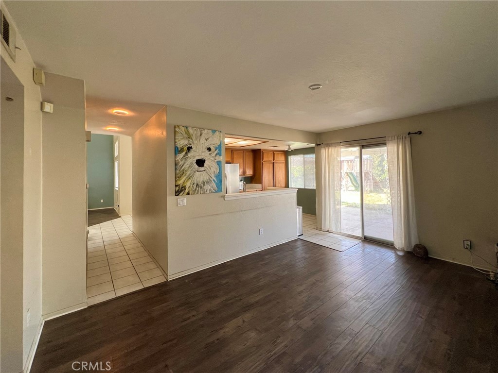 1505 Salmon River Road Riverside, CA 92501 - Photo 8 of 20 a view of a kitchen with wooden floor and a kitchen