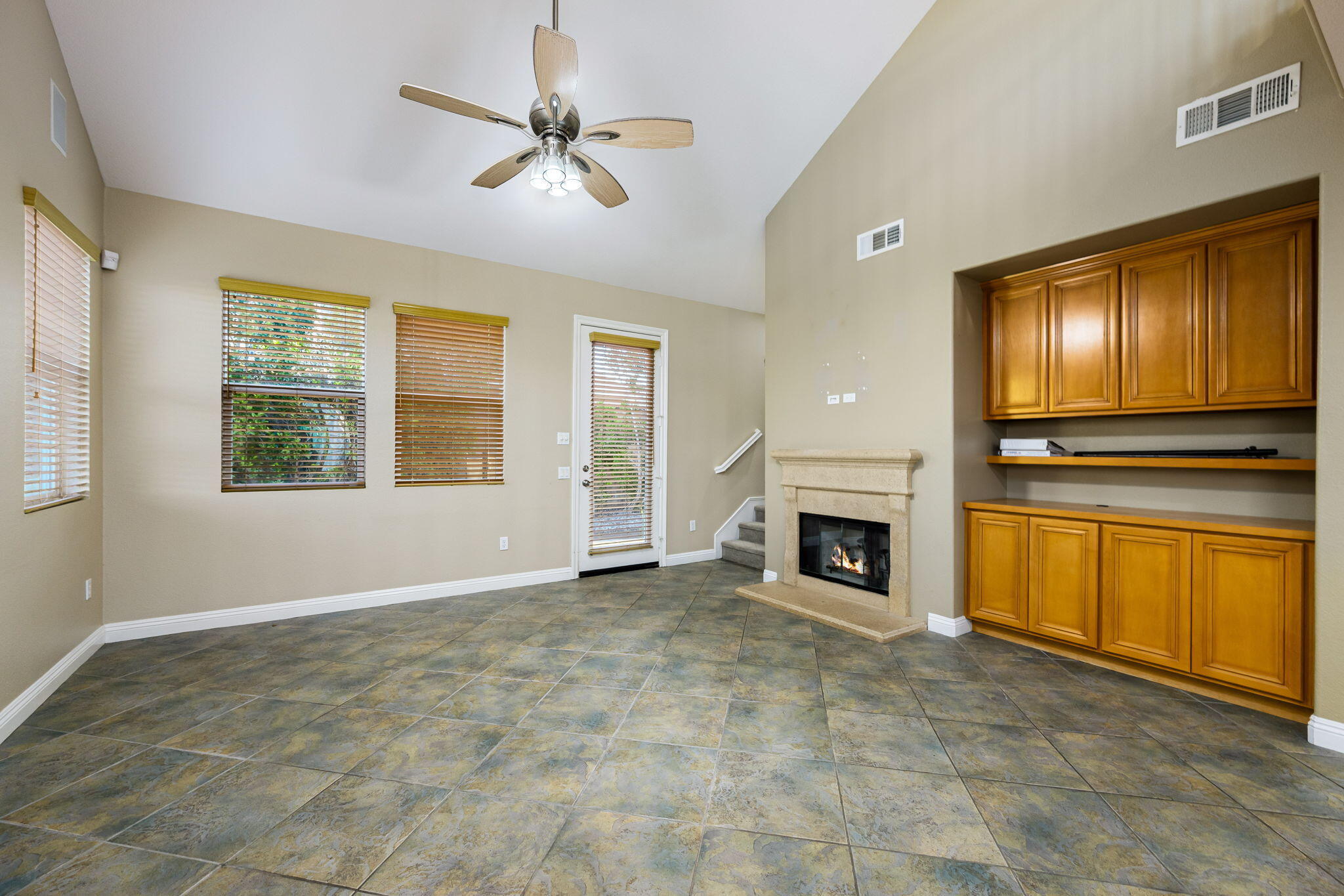 80510 Denton Drive Indio, CA 92203 - Photo 28 of 80 a view of an empty room with window and fireplace